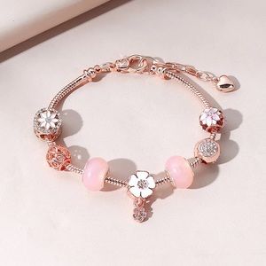 Bracelet light pink, adjustable size extension.